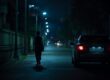 lone female worker walking to car at night