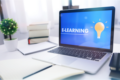 Laptop displaying an e-learning course, representing flexible online training for busy health and social care teams